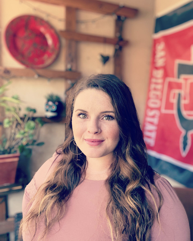 A picture of Brittnie looking into the camera.